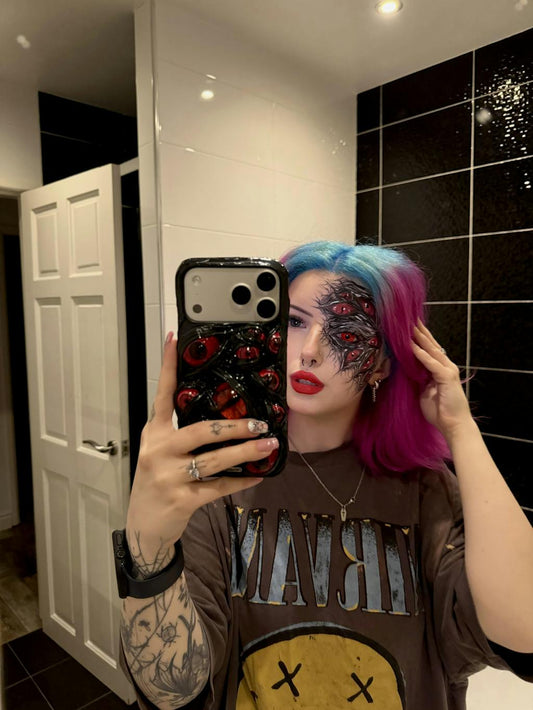 Customer photo of Cat Eye in the Dark Handmade iPhone Case by Techypop